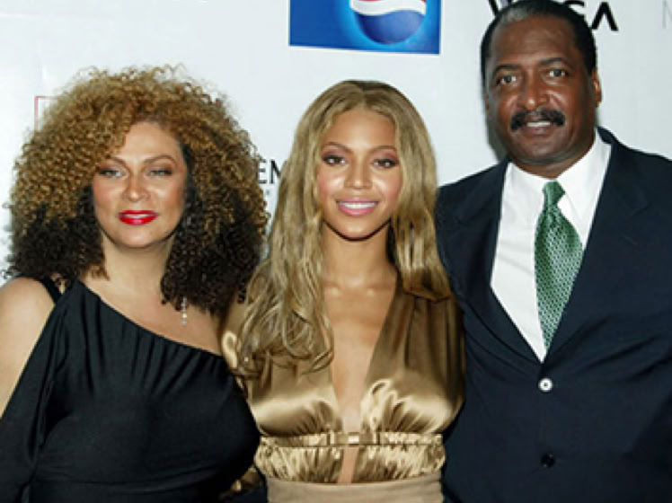 Singer Beyonce Knowles and parents, mom, dad.